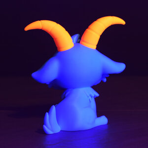 Cute Satan Goat back view under UV light